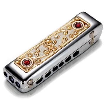 a harmonica with a red stone in the middle