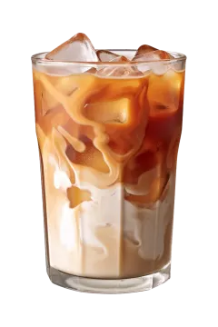 a tall glass of iced coffee with ice
