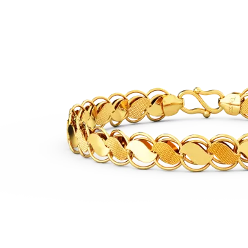 a gold bracelet on a white background