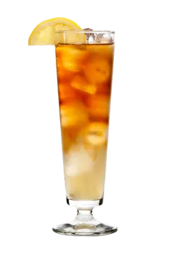 a tall glass filled with ice and a lemon slice