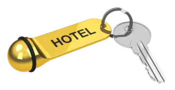 a golden key with the word hotel on it