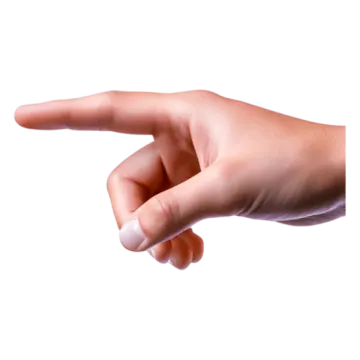 a person's hand pointing at something