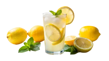 a glass of lemon water with lemons and mint
