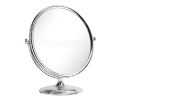 an oval mirror on a white background