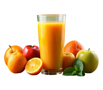 a glass of orange juice next to some fruit