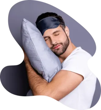 a man sleeping with his head on a pillow