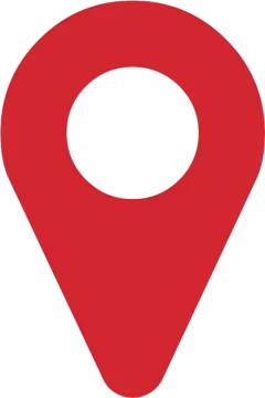 a red pin with a white circle on it