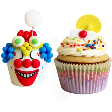 two cupcakes with clown faces on them