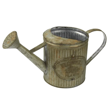 an old watering can with a metal handle