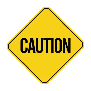 a yellow caution sign that says caution