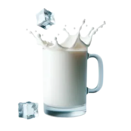 a glass of milk with ice on the side