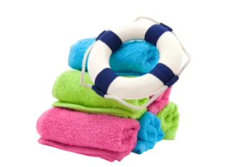 a pile of towels with a life ring on top