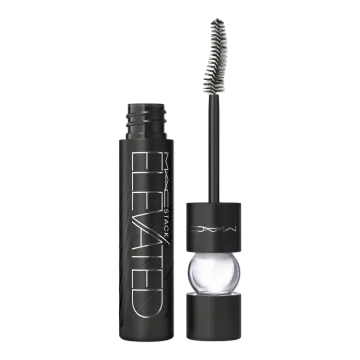a mascara with a brush on top of it
