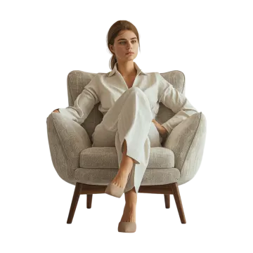a woman sitting in a chair with her legs crossed