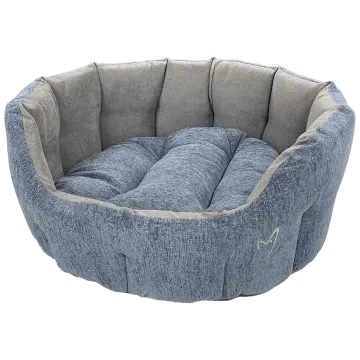 a blue denim dog bed with a white background