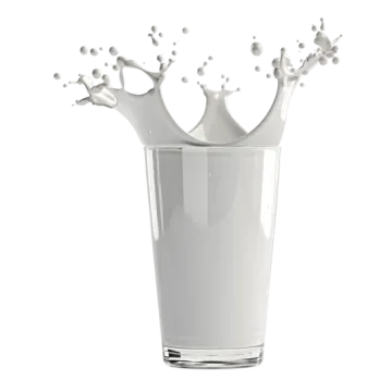 a glass filled with milk and splashing