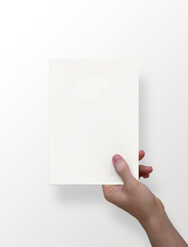 a hand holding a piece of paper