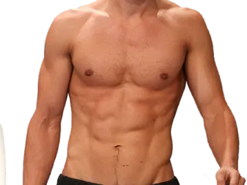 a man with no shirt standing next to a white wall