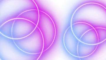 a pink and blue abstract background with circles