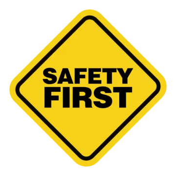 a yellow sign that says safety first