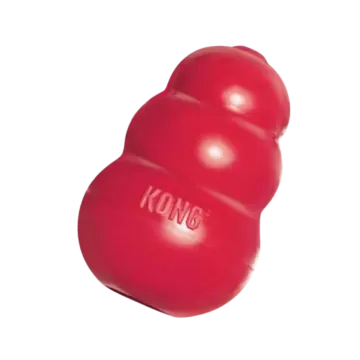 a red kong dog toy on a white background