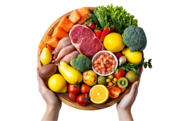 a person holding a wooden bowl filled with lots of food