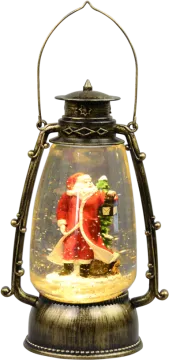a glass lantern with a christmas decoration inside