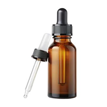 a brown glass bottle with a droper and a white drople