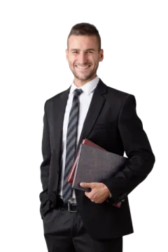 a man in a suit and tie holding a book