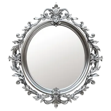 a round mirror with silver leaves on it