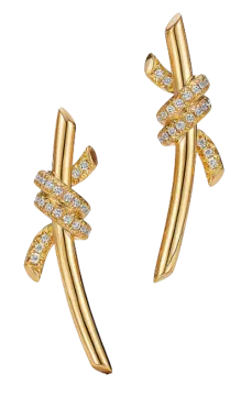 a pair of gold earrings with diamonds
