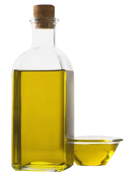 a bottle of olive oil next to a bowl