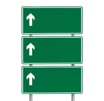a green road sign with two arrows pointing left and right