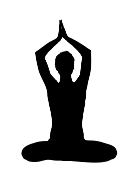 a silhouette of a woman doing yoga