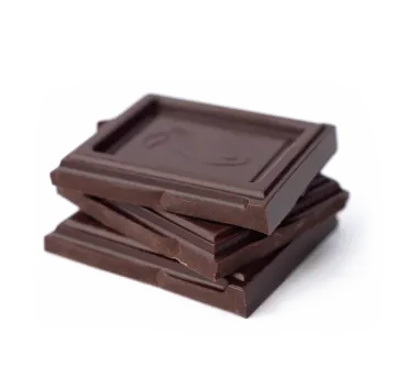 three pieces of chocolate on a white background