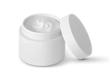 a jar of cream on a white background