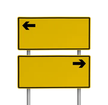 two yellow signs with an arrow pointing left and right