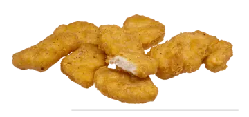 a pile of chicken nus on a white background