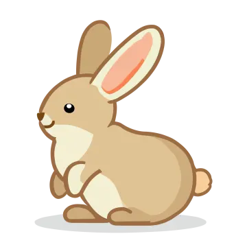 a brown rabbit sitting on the ground
