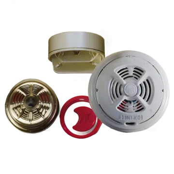a white smoke detector and a red ring
