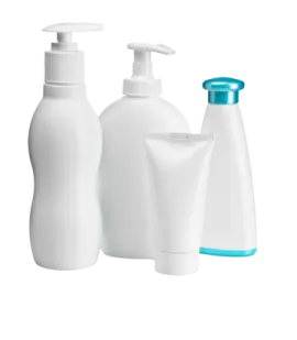 a set of three white bottles with blue caps