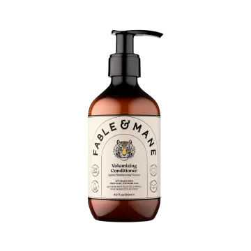 a bottle of hand soap on a white background