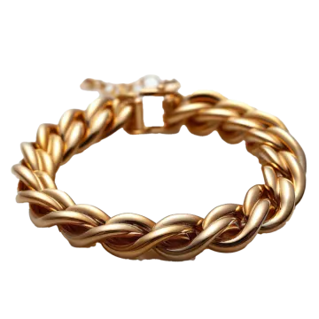 a gold bracelet on a white background