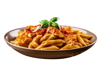 a bowl of pasta with tomato sauce and basil