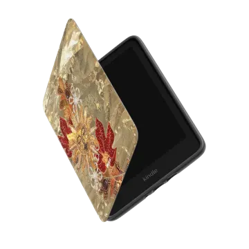 a phone case with a gold leaf design on it