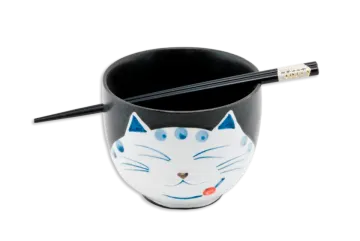 a black and white cup with a cat face on it