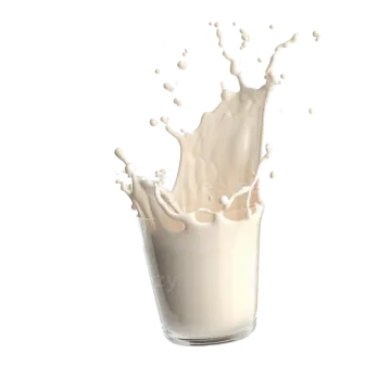 a glass of milk splashing into it