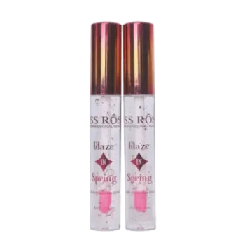 a pair of sprays with pink liquid and gold cap