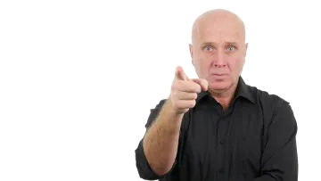 a man pointing his finger at the camera