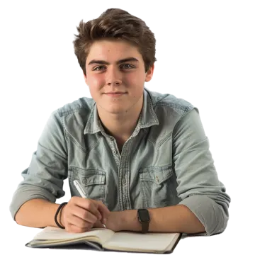a young man sitting at a table writing